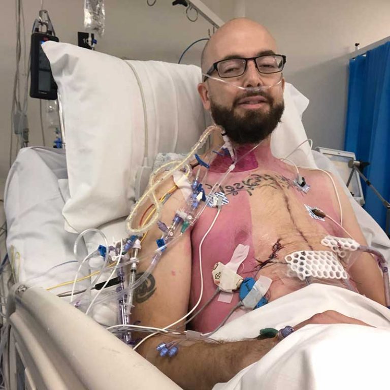 Ross recovering in hospital after major heart surgery with Marfan Syndrome